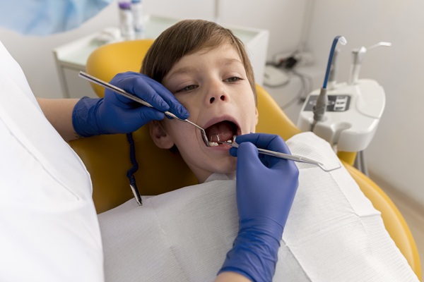 Happy child getting treated at Kolkata dental clinic