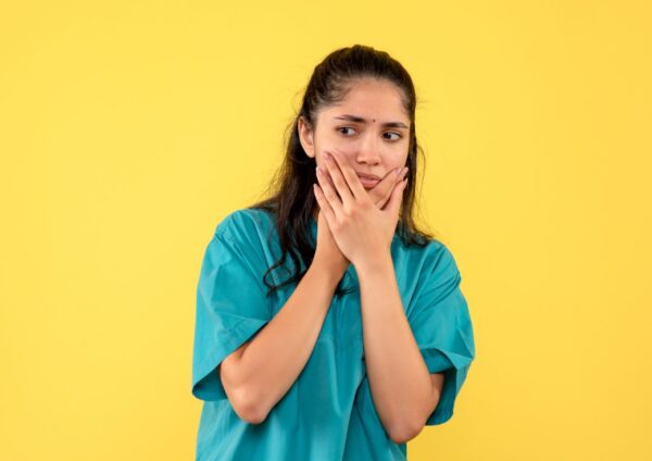Patient with badly damaged teeth considering dental restoration